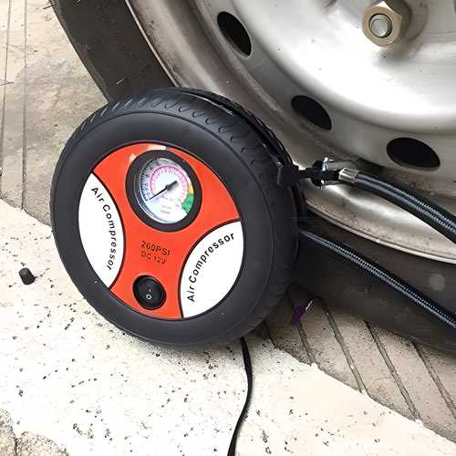 Portable Electric Tyre Shape Car Air Compressor Pump – Inflate Anytime, Anywhere!